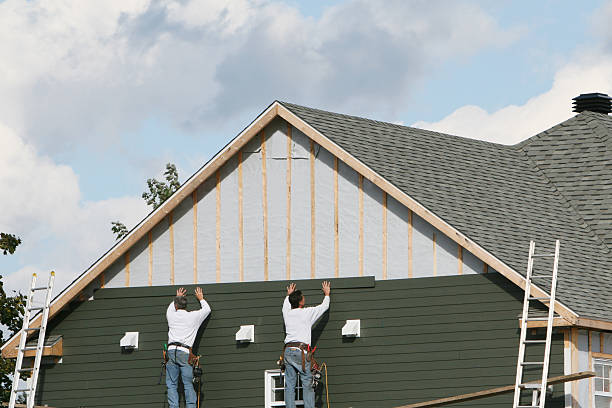 Professional Siding Contractor technician working in Breezewood, PA